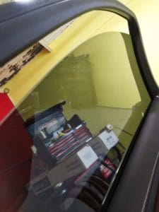 Close-up view of window tint work